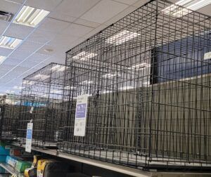 Wire dog crate on store shelf
